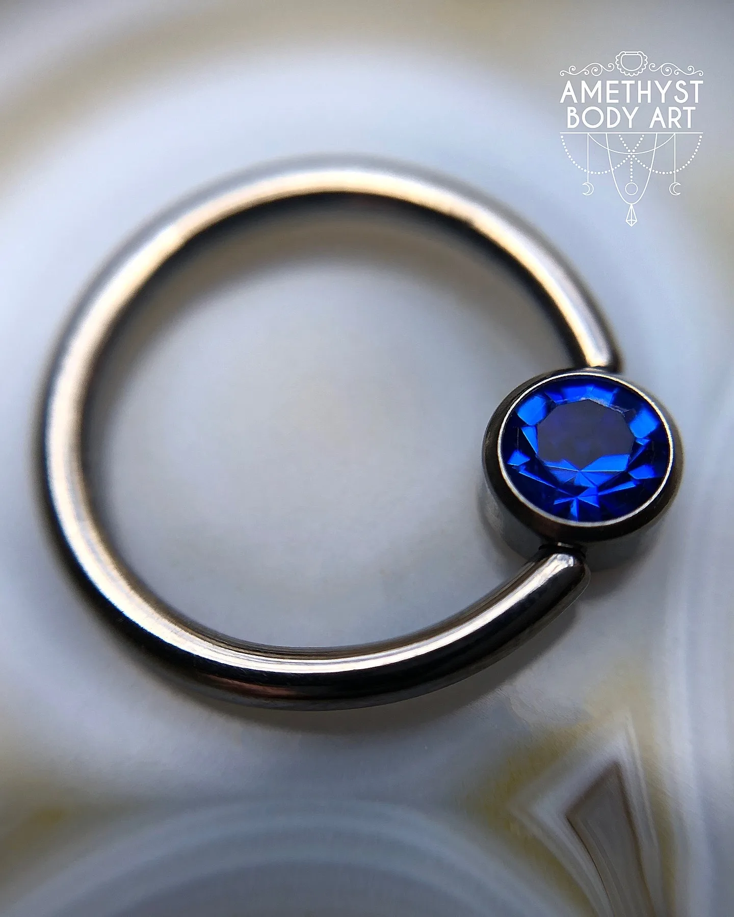 Titanium Captive Bead Ring With 4mm Dark Blue CZ