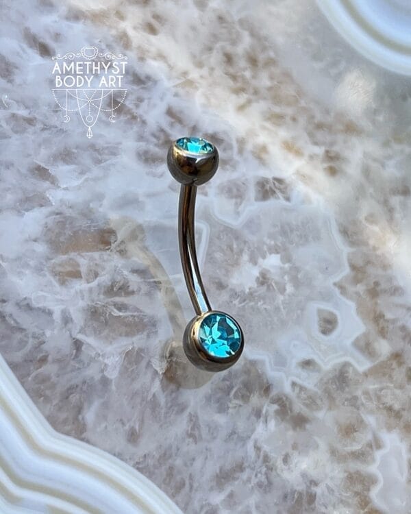 TI Navel Curve - Aqua CZ Externally Threaded (5mm, 6mm ball)