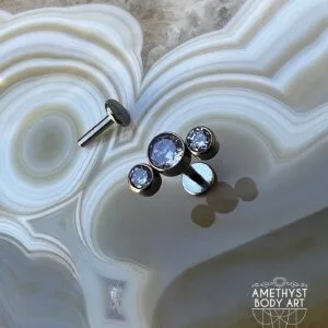 Cluster with 3 Bezel set Purple CZ and Titanium Labret.