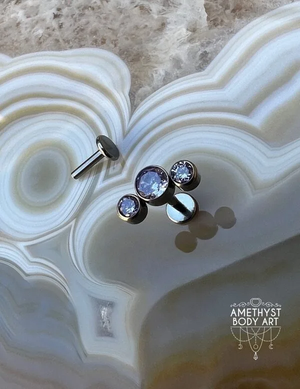 Cluster with 3 Bezel set Purple CZ and Titanium Labret.