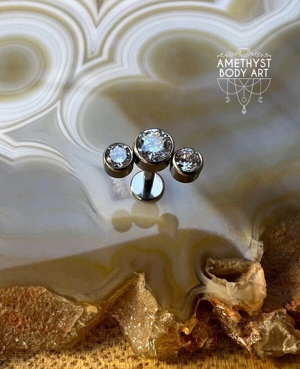 Cluster with 3 Bezel set Clear CZ and Titanium Labret. - Image 3