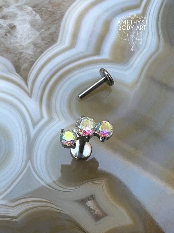 Cluster with 3 Prong set Aurora Borealis CZ and Titanium Labret.