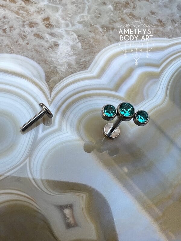 Cluster with 3 Bezel set Green CZ and Titanium Labret. - Image 2
